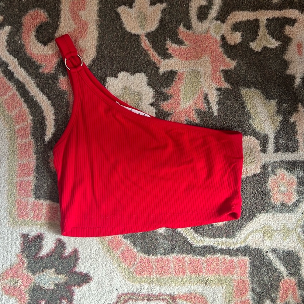 Red asymmetrical top.